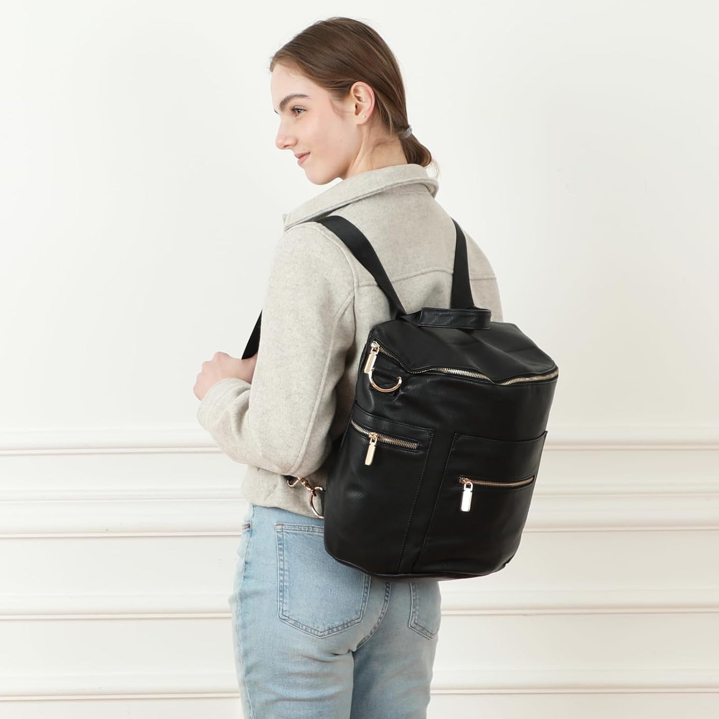 Premium Leather Diaper Backpack with 16 Pockets, Changing Pad, Stroller Straps, and Insulated Compartments - Convertible Design in Black