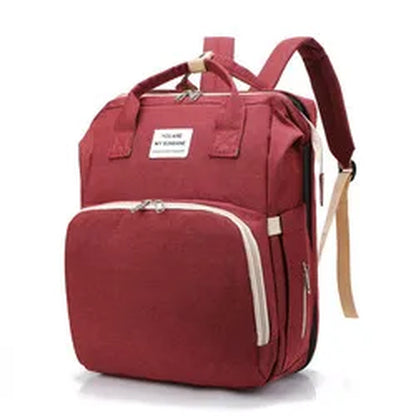 Stylish Multi-Functional Mommy Bag with Folding Baby Bed and Large Capacity for Diapers and Milk Bottles