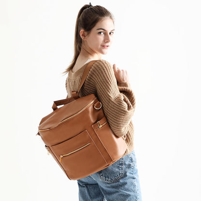 Luxury Leather Diaper Bag Backpack with Changing Pad, Stroller Straps, and Insulated Pockets - Convertible Design in Brown