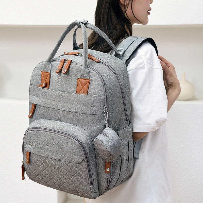 Premium Waterproof Diaper Backpack with Integrated Changing Station and Stroller Straps for Parents